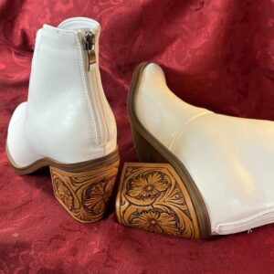 Floral Carved Leather Heels added to a boot.